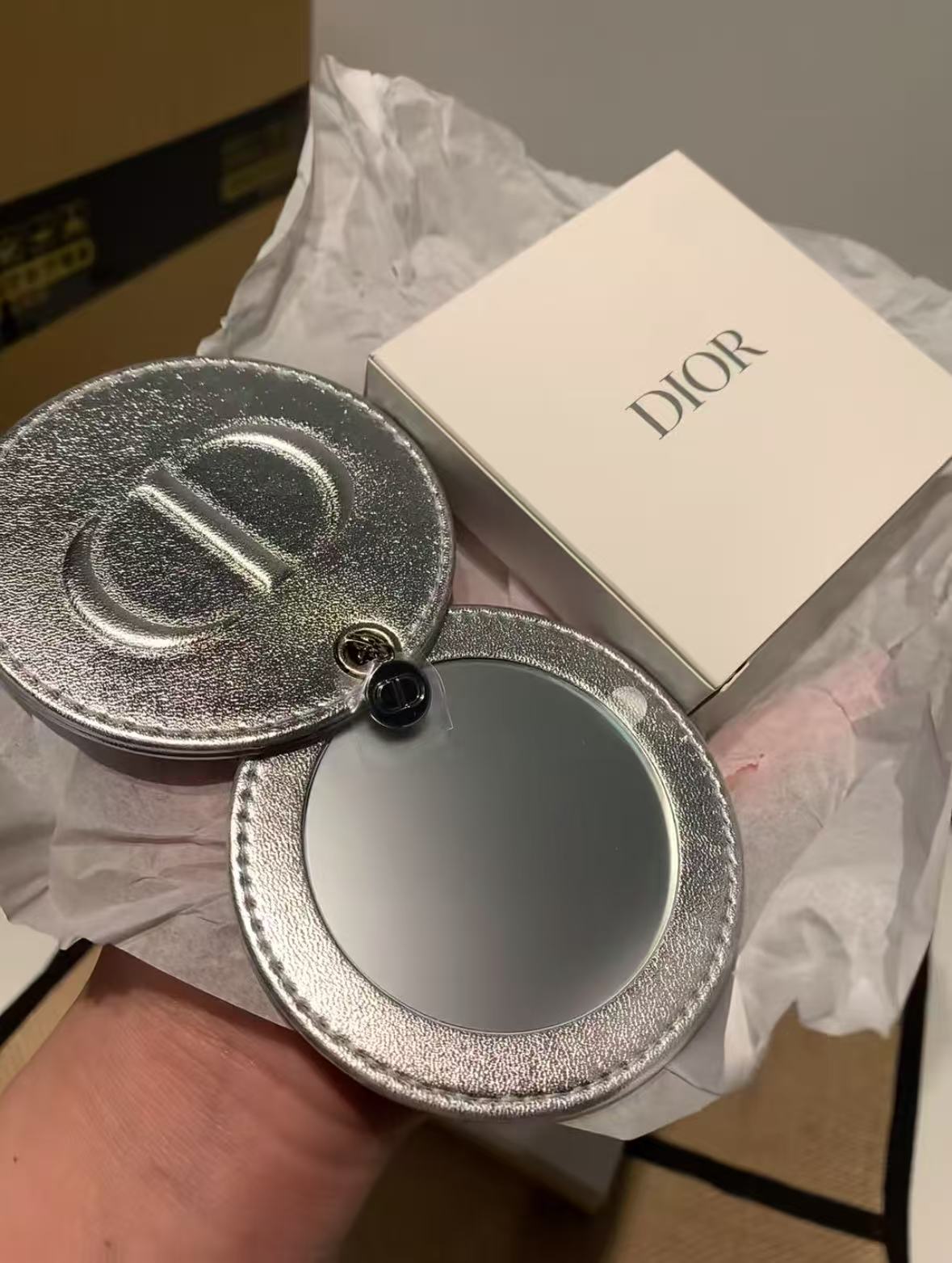 D-IOR silver lambskin compact mirror – complimentary VIP gift.